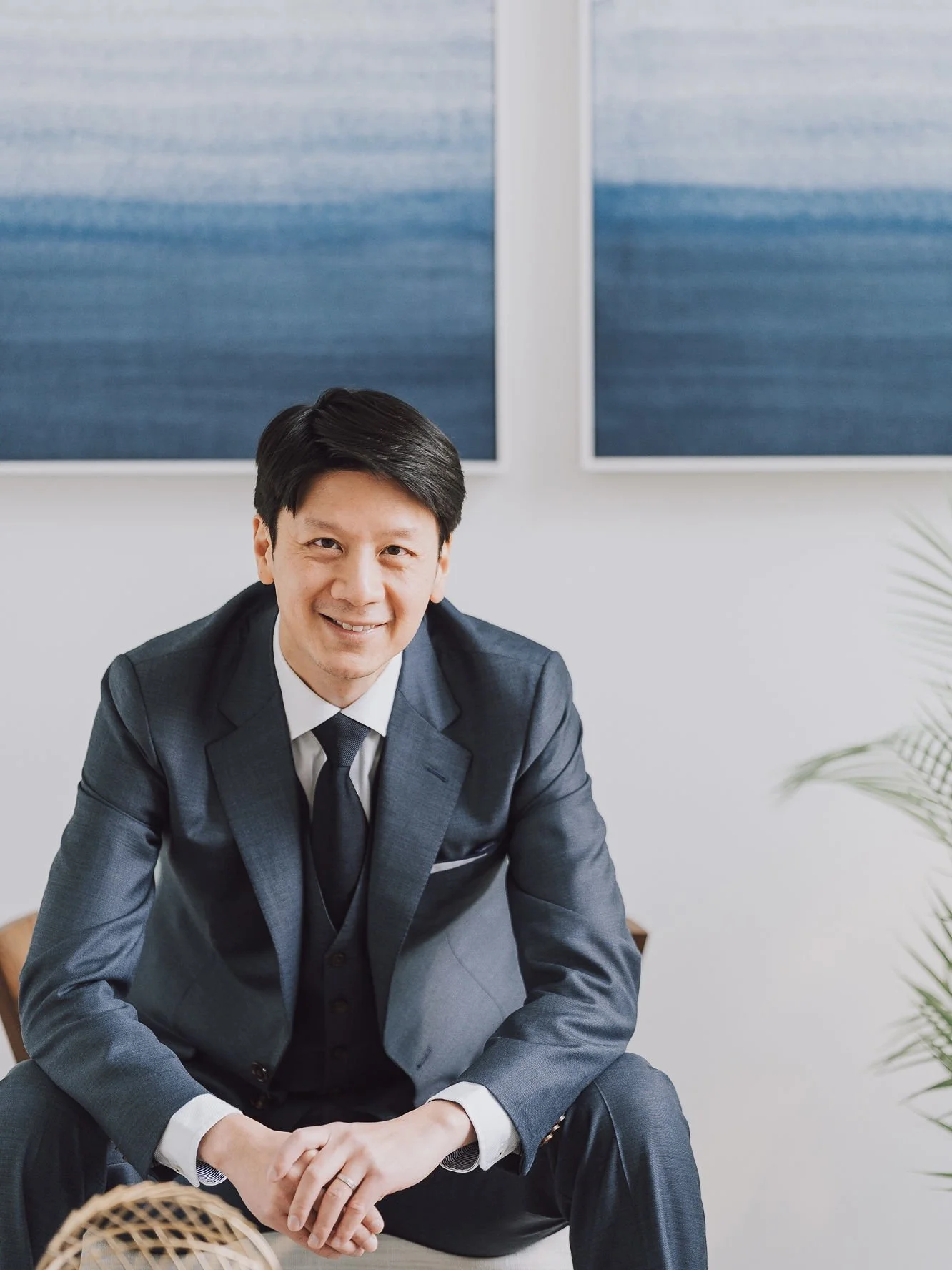 Alan Yeh, Vancouver realtor, in a navy suit